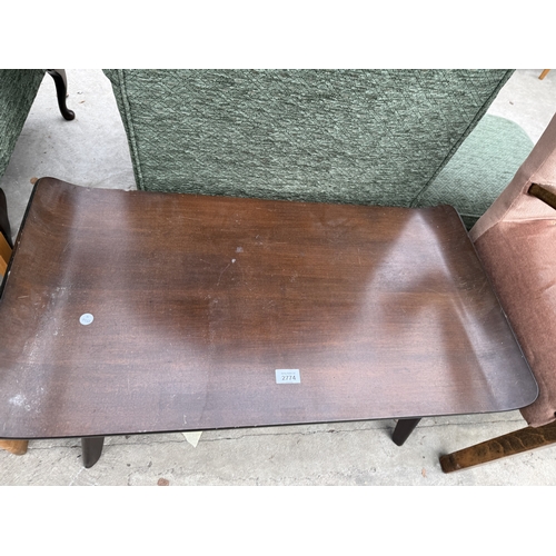 2774 - A MID CENTURY MAHOGANY SURF BOARD STYLE COFFEE TABLE