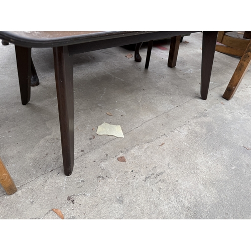 2774 - A MID CENTURY MAHOGANY SURF BOARD STYLE COFFEE TABLE
