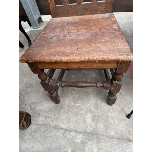 2796 - A TWO TIER WICKER COFFEE TABLE ON METALWARE FRAME AND AN OAK AND PINE COUNTRY CHAIR