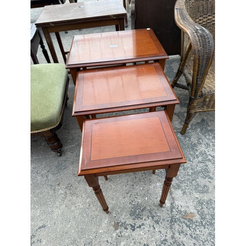 2837 - A YEW WOOD NEST OF THREE TABLES