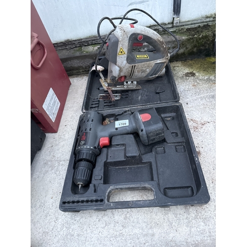 1709 - AN ELECTRIC JIGSAW AND A CORDLESS DRILL