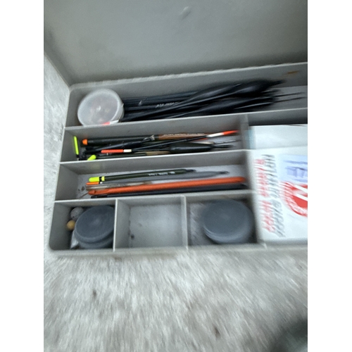 1711 - A WICKER FISHING TACKLE BASKET WITH AN ASSORTMENT OF FISHING TACKLE TO INCLUDE REELS AND FLOATS ETC