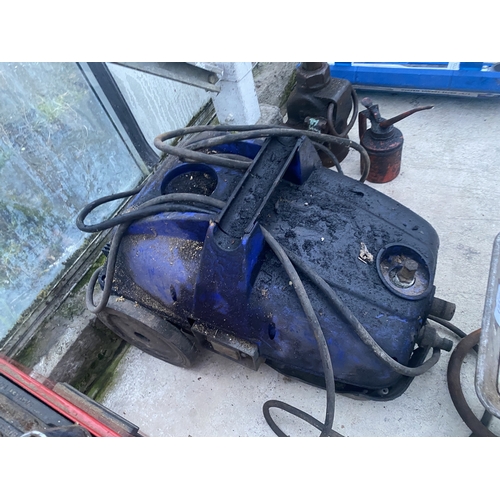 1715 - AN ELECTRIC PRESSURE WASHER AND A HEAT LAMP
