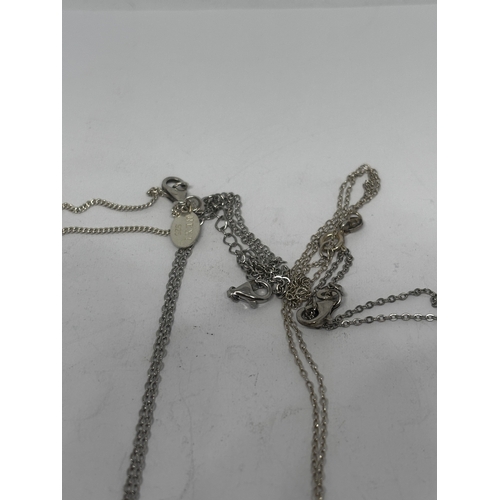 550 - FOUR SILVER NECKLACES WITH PENDANTS GROSS WEIGHT 18.45 GRAMS