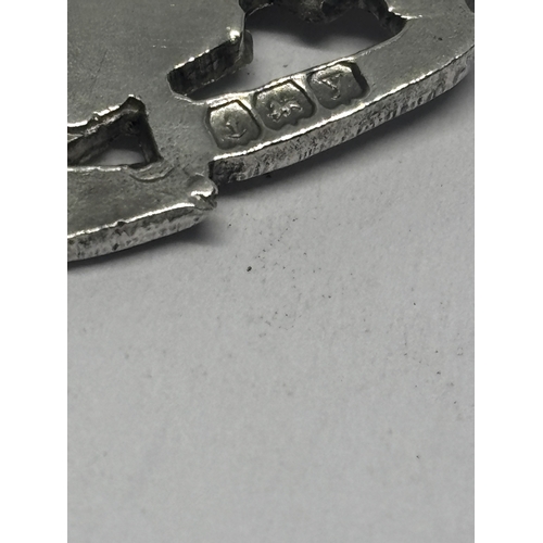 563 - A HALLMARKED BIRMINGHAM SILVER AND GOLD FOB GROSS WEIGHT 7.95 GRAMS