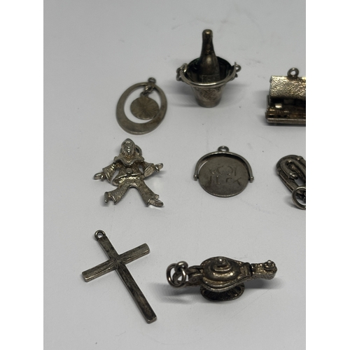569 - SIXTEEN SILVER CHARMS GROSS WEIGHT 38.37 GRAMS