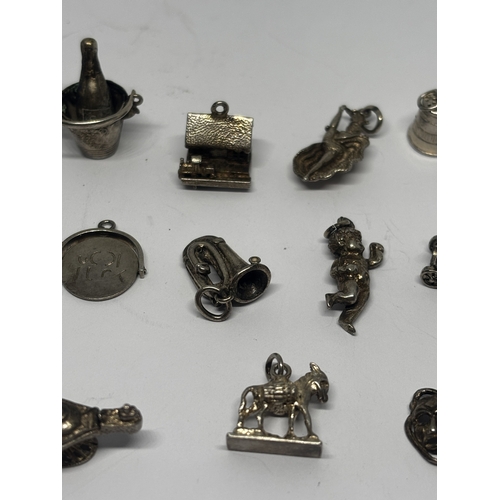 569 - SIXTEEN SILVER CHARMS GROSS WEIGHT 38.37 GRAMS