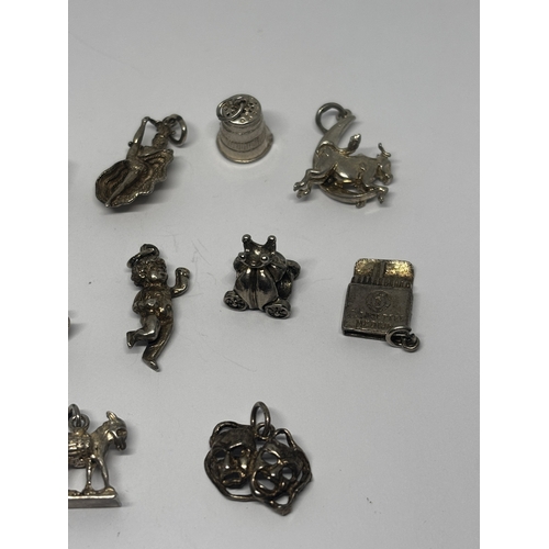 569 - SIXTEEN SILVER CHARMS GROSS WEIGHT 38.37 GRAMS