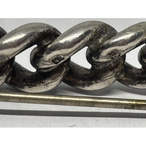 581 - TWO SILVER BROOCHES GROSS WEIGHT 21.07 GRAMS