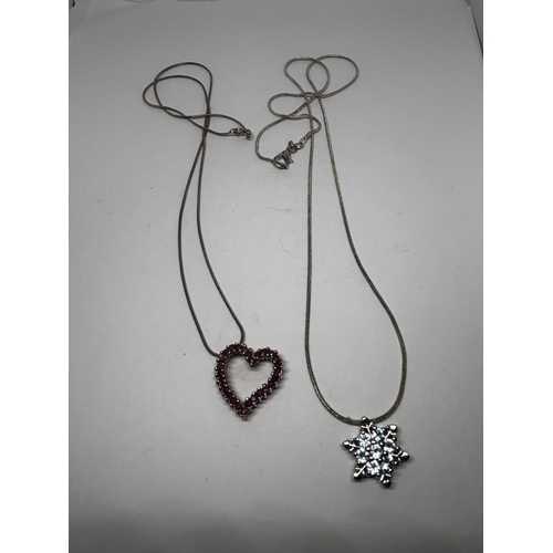 585 - TWO SILVER NECKLACES WITH PENDANTS GROSS WEIGHT 14.02 GRAMS
