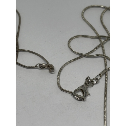 585 - TWO SILVER NECKLACES WITH PENDANTS GROSS WEIGHT 14.02 GRAMS
