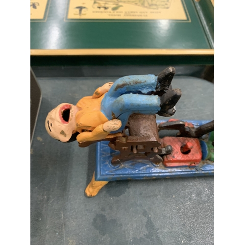 81 - A CAST MECHANICAL COIN BANK 