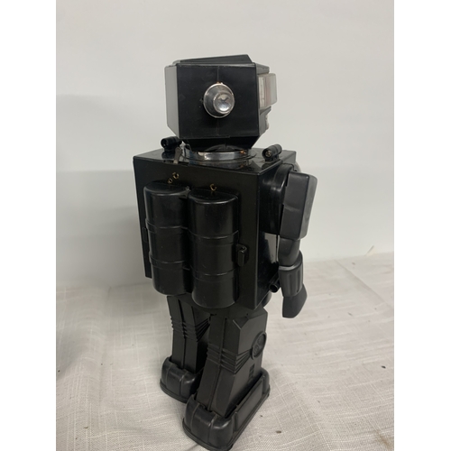 303 - A VINTAGE BATTERY OPERATED MOON EXPLORER IN ORIGINAL BOX