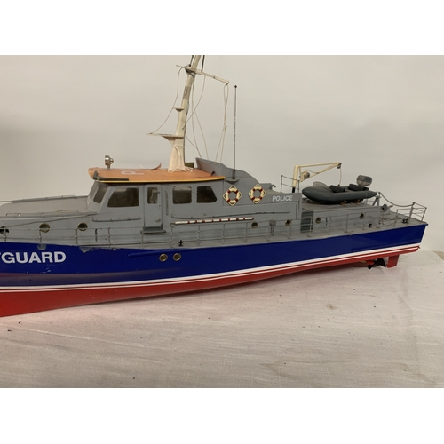 308 - A LARGE MODEL OF A POLICE COASTGUARD BOAT, LENGTH 92CM, HEIGHT 43CM