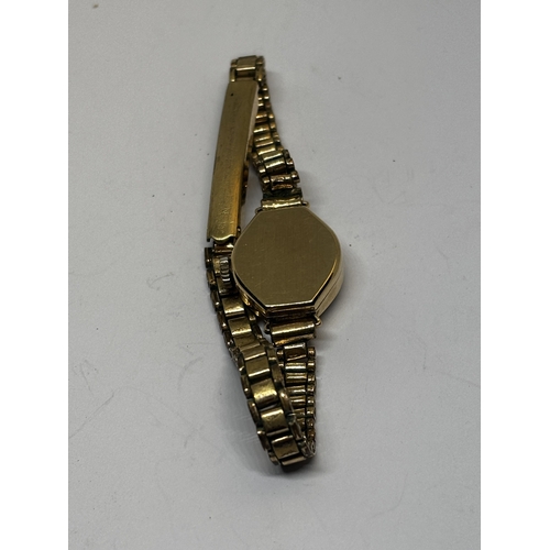 761 - A 9 CARAT GOLD EXCALIBUR COCKTAIL WATCH WITH A PLATED STRAP GROSS WEIGHT 12.92 GRAMS
