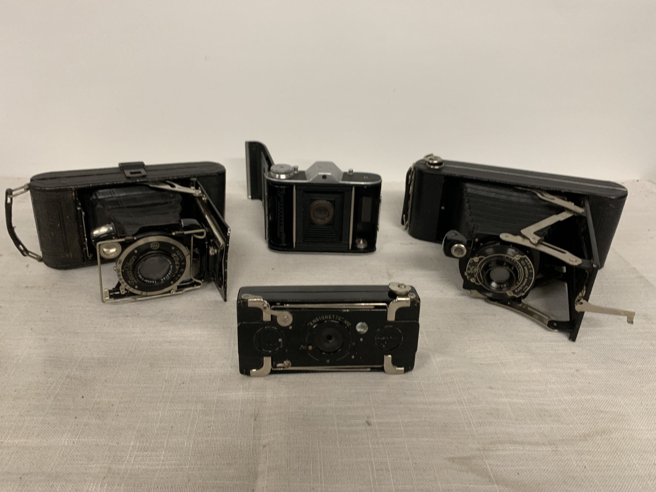 FOUR VINTAGE 1920S FOLDING CAMERAS TO INCLUDE KODAK POCKET 1A ...