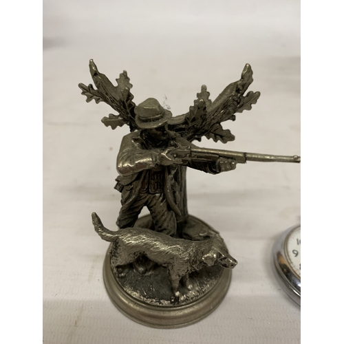 133 - A HEAVY PEWTER GAME KEEPER WATCH STAND WITH AN INGERSOLL POCKET WATCH