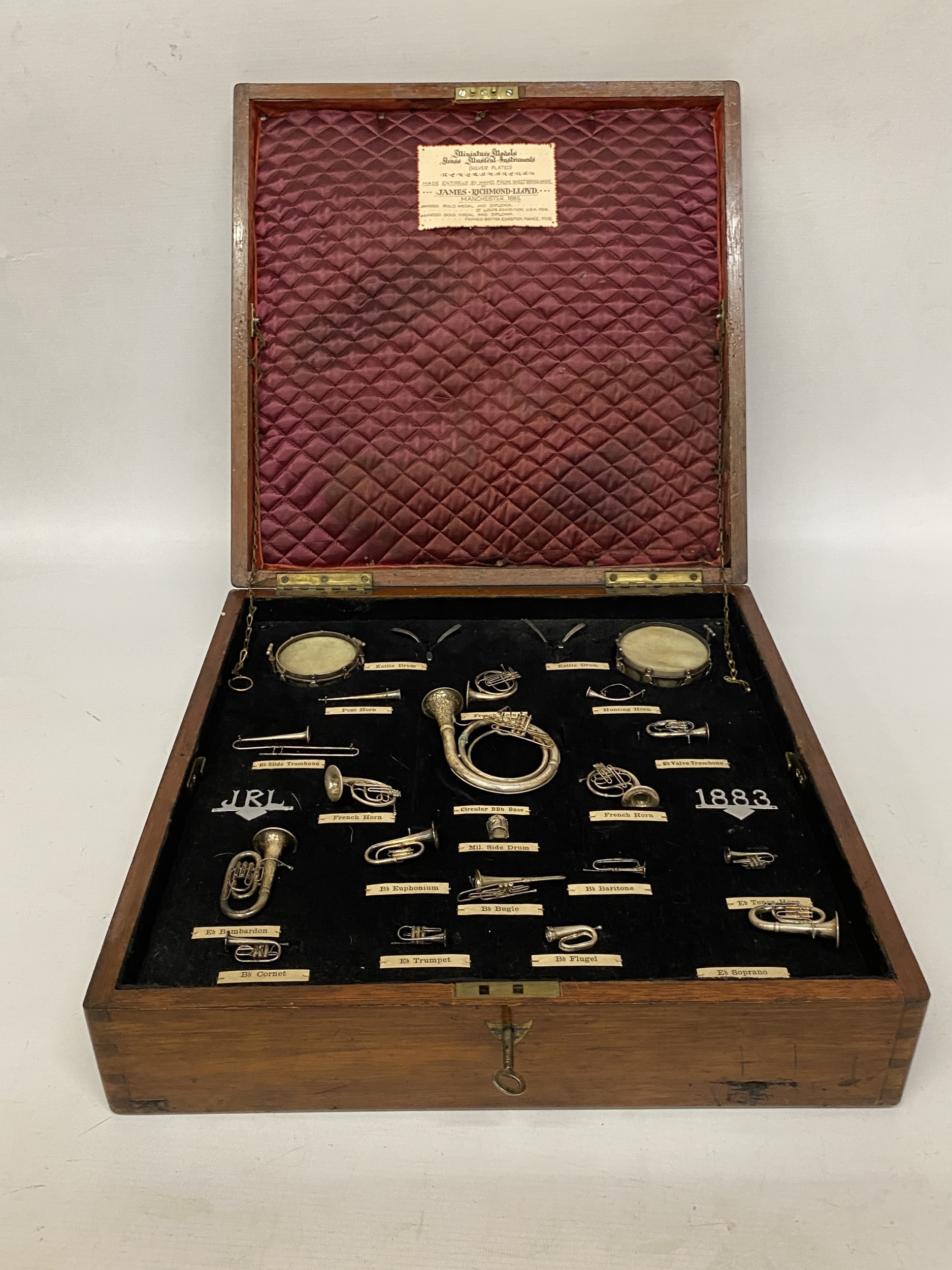 A VINTAGE SET OF MINIATURE BRASS, SILVER PLATED MUSICAL INSTRUMENTS ...