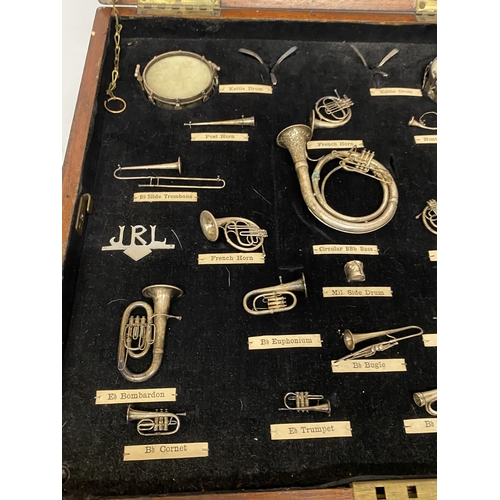 A VINTAGE SET OF MINIATURE BRASS, SILVER PLATED MUSICAL INSTRUMENTS ...