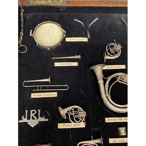 A VINTAGE SET OF MINIATURE BRASS, SILVER PLATED MUSICAL INSTRUMENTS ...