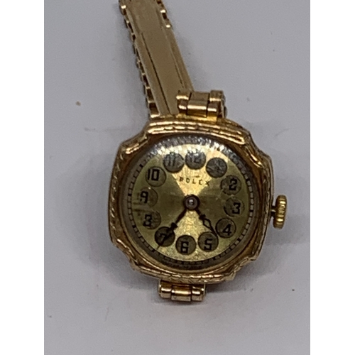 571 - A 9 CARAT GOLD LADIES ROLEX WRIST WATCH WITH 9 CARAT GOLD PLATED STRAP GROSS WEIGHT 21.95 GRAMS