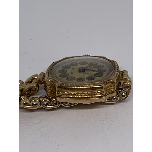 571 - A 9 CARAT GOLD LADIES ROLEX WRIST WATCH WITH 9 CARAT GOLD PLATED STRAP GROSS WEIGHT 21.95 GRAMS