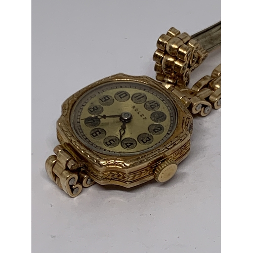 571 - A 9 CARAT GOLD LADIES ROLEX WRIST WATCH WITH 9 CARAT GOLD PLATED STRAP GROSS WEIGHT 21.95 GRAMS