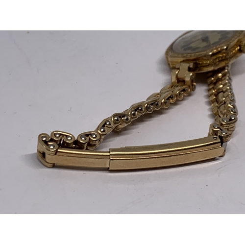 571 - A 9 CARAT GOLD LADIES ROLEX WRIST WATCH WITH 9 CARAT GOLD PLATED STRAP GROSS WEIGHT 21.95 GRAMS