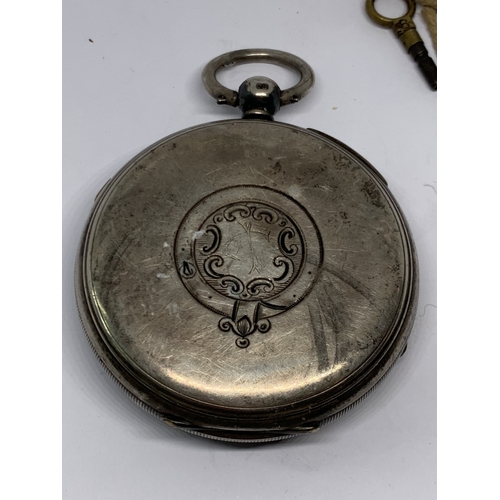 580 - A HALLMARKED CHESTER SILVER CENTRE SECONDS CHRONOGRAPH WRIST WATCH WITH WHITE ENAMEL FACE, ROMAN NUM... 