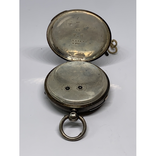 580 - A HALLMARKED CHESTER SILVER CENTRE SECONDS CHRONOGRAPH WRIST WATCH WITH WHITE ENAMEL FACE, ROMAN NUM... 