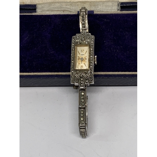 583 - A VINTAGE SILVER AND MARCASITE COCKTAIL WATCH IN A PRESENTATION BOX