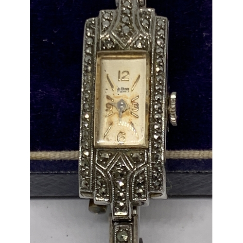 583 - A VINTAGE SILVER AND MARCASITE COCKTAIL WATCH IN A PRESENTATION BOX