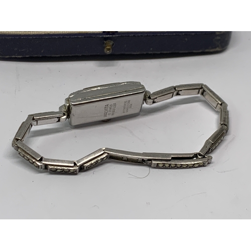 583 - A VINTAGE SILVER AND MARCASITE COCKTAIL WATCH IN A PRESENTATION BOX