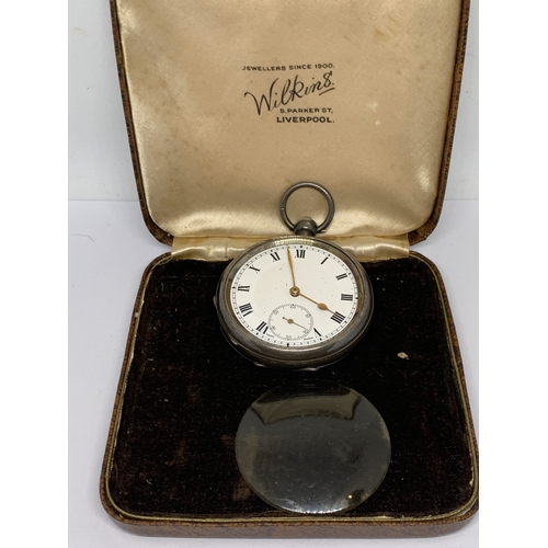 781 - A HALLMARKED BIRMINGHAM SILVER POCKET WATCH WITH WHITE ENAMEL FACE, SUB DIAL AND ROMAN NUMERALS