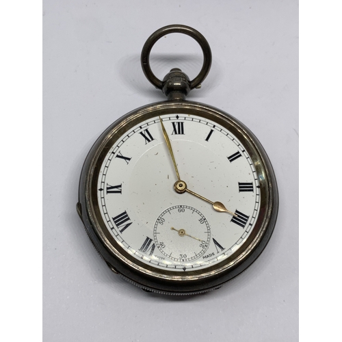 781 - A HALLMARKED BIRMINGHAM SILVER POCKET WATCH WITH WHITE ENAMEL FACE, SUB DIAL AND ROMAN NUMERALS