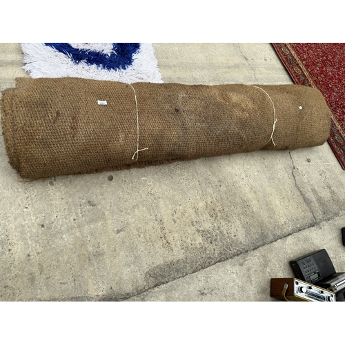 A LARGE HESSIAN RUG