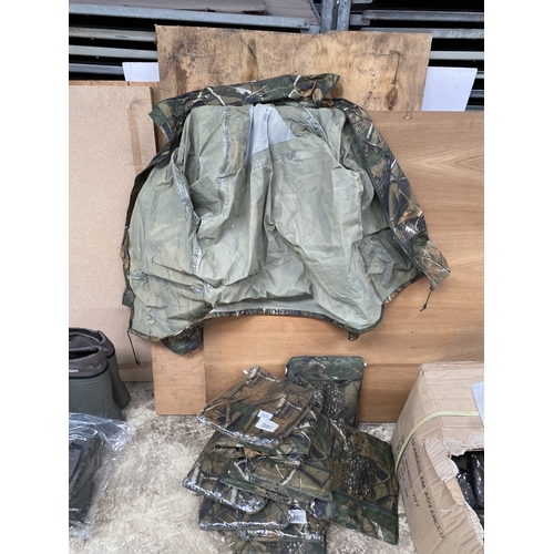 3932 - TWELVE PAIRS OF WATERPROOF CAMOFLAUGE TROUSERS