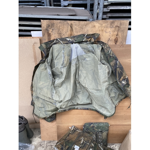3932 - TWELVE PAIRS OF WATERPROOF CAMOFLAUGE TROUSERS