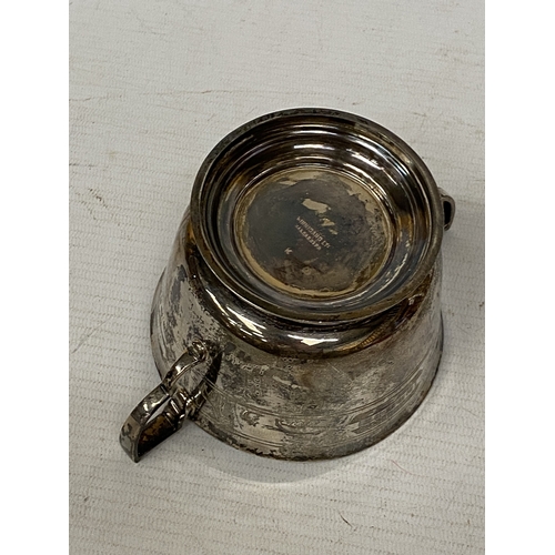 3 - A HALLMARKED 1935 LONDON SILVER TWIN-HANDLED CUP WITH AN ENGRAVED DESIGN ON THE BODY, MAKER FINNIGAN... 