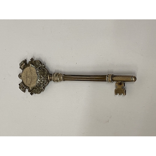 5 - A HALLMARKED BIRMINGHAM SILVER KEY ENGRAVED 
