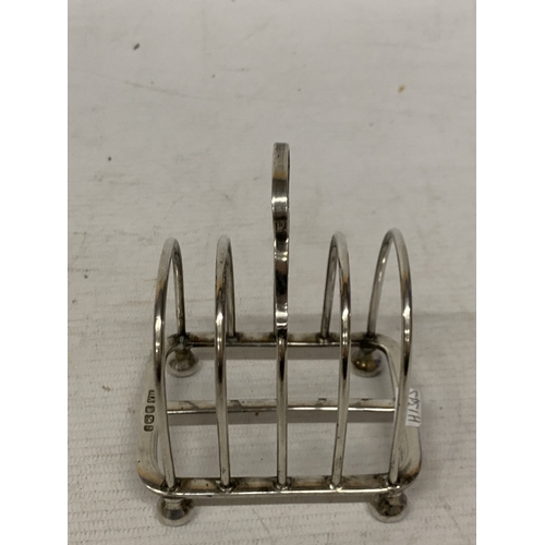 16 - A HALLMARKED SHEFFIELD SILVER TOAST RACK WEIGHT 125.7 GRAMS WIDTH 10CM HEIGHT 10CM