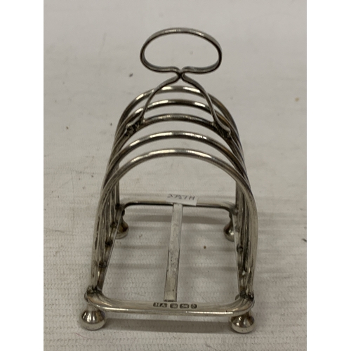 16 - A HALLMARKED SHEFFIELD SILVER TOAST RACK WEIGHT 125.7 GRAMS WIDTH 10CM HEIGHT 10CM