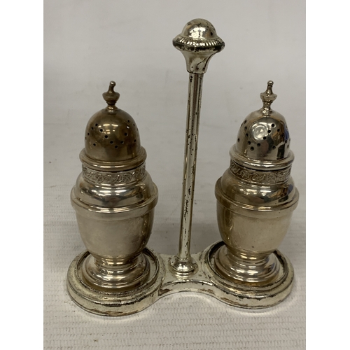 9 - A HALLMARKED BIRMINGHAM SILVER SALT & PEPPER POT WITH STAND - WEIGHT 91G