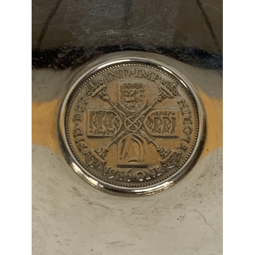 48 - A HALLMARKED LONDON SILVER DISH WITH A 1936 FLORIN SET INTO THE CENTER. GROSS WEIGHT 90.9 GRAMS