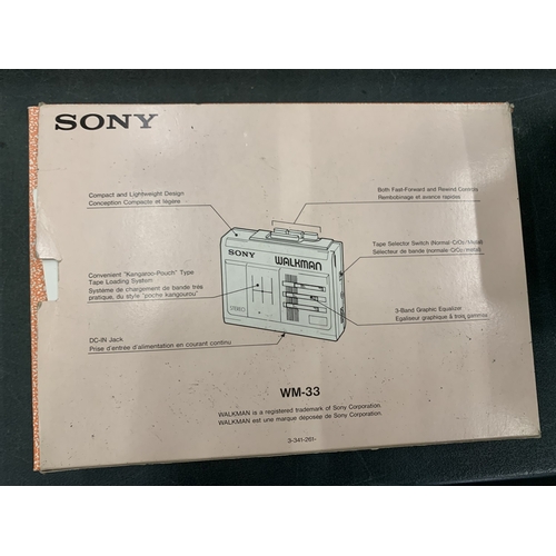 50A - A VINTAGE SONY WALKMAN WM-33 CASSETTE PLAYER IN AS NEW CONDITION