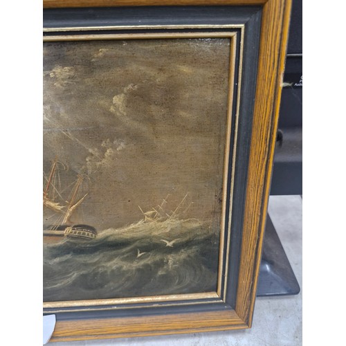 56 - A LATE 19TH/EARLY 20TH CENTURY OIL ON BOARD OF SHIPS IN A STORM, 19CM X 24CM, FRAMED