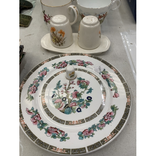 203 - AN ASSORTMENT OF CERAMIC ITEMS TO INCLUDE CUPS, CRUET SET, PLATES, THIMBLE ETC