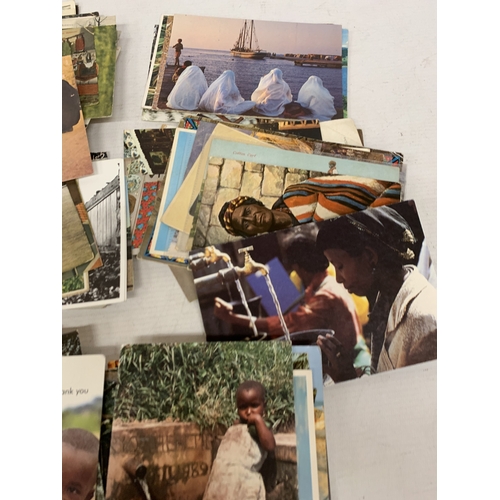 213 - A LARGE COLLECTION OF VINTAGE FOREIGN POSTCARDS