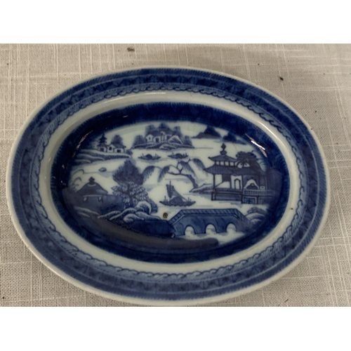 412 - A CHINESE EXPORT  CANTON PORCELAIN SERVING DISH  WITH BLUE AND WHITE UNDERGLAZE WITH A LANDSCAPE SCE... 