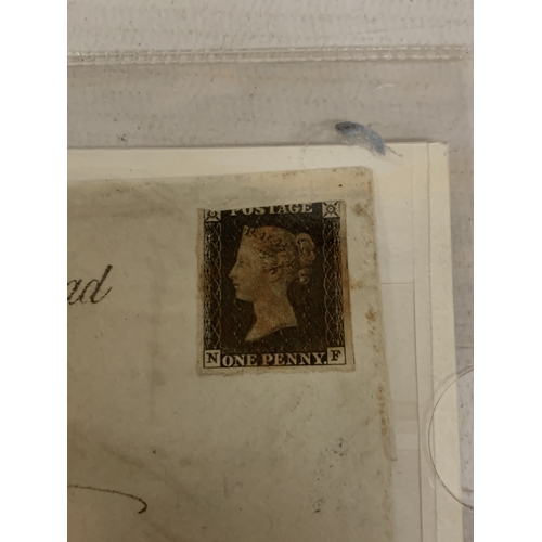 12 - AN 1840 PENNY BLACK STAMP ON AN ENVELOPE SHOWING STRIKES OF MORETON HAMPSTEAD AND EXETER